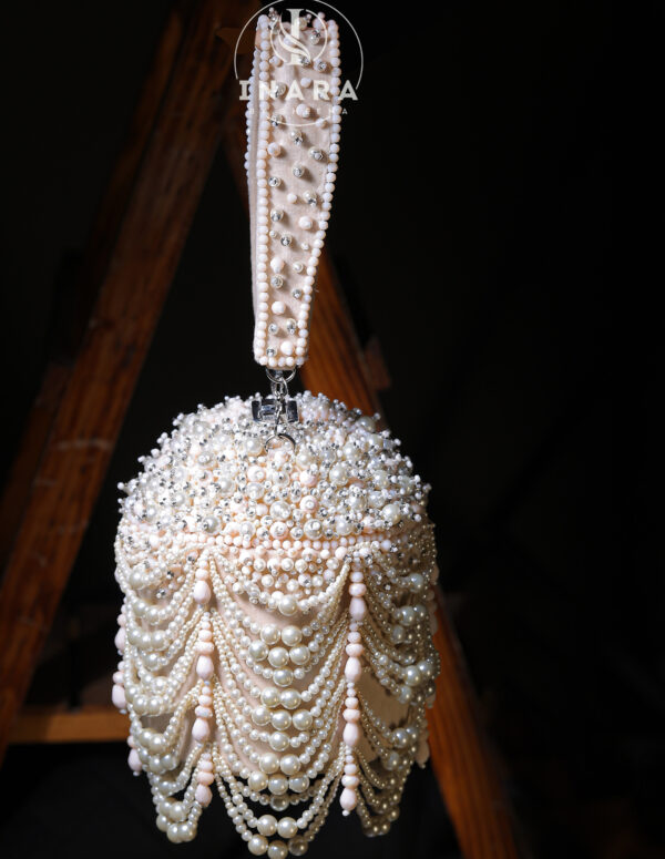 The Miraaz Ivory pastel bucket bag